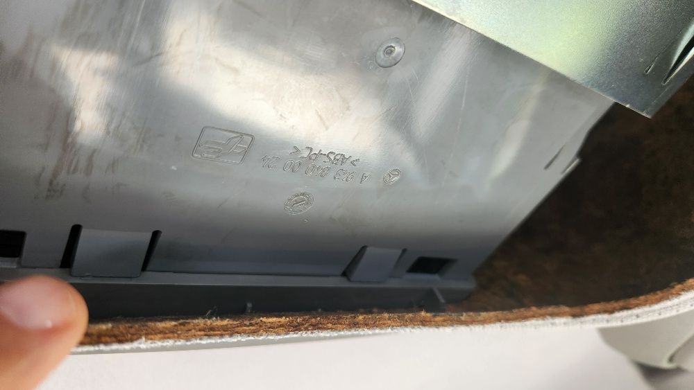 Plastic clips inside bottom of unit cover.jpg