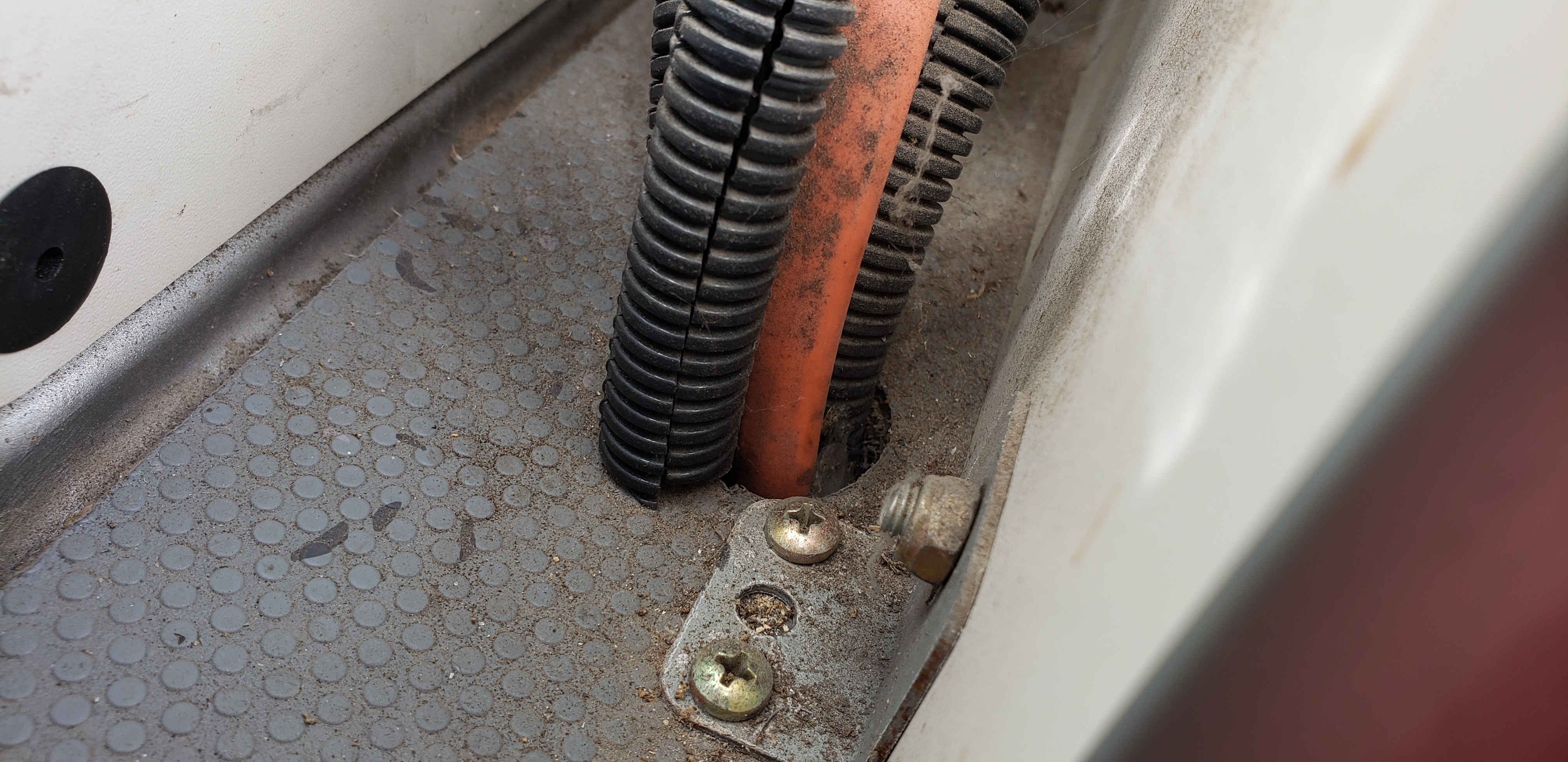 Camera cable going through floor to underneath van